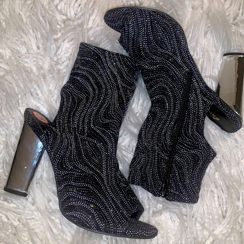 Open Back/peep toe pumps embellished heels.